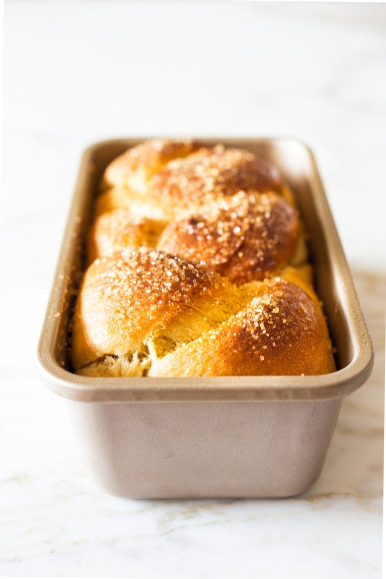 A traditional recipe for Pulla- a slightly sweet, Finnish Cardamon Bread that tastes and smells heavenly. Perfect for mornings or afternoon tea. | www.feastingathome.com. #pulla #pullarecipe #coffeebread #morningbread #finnishbread #finnishrecipes