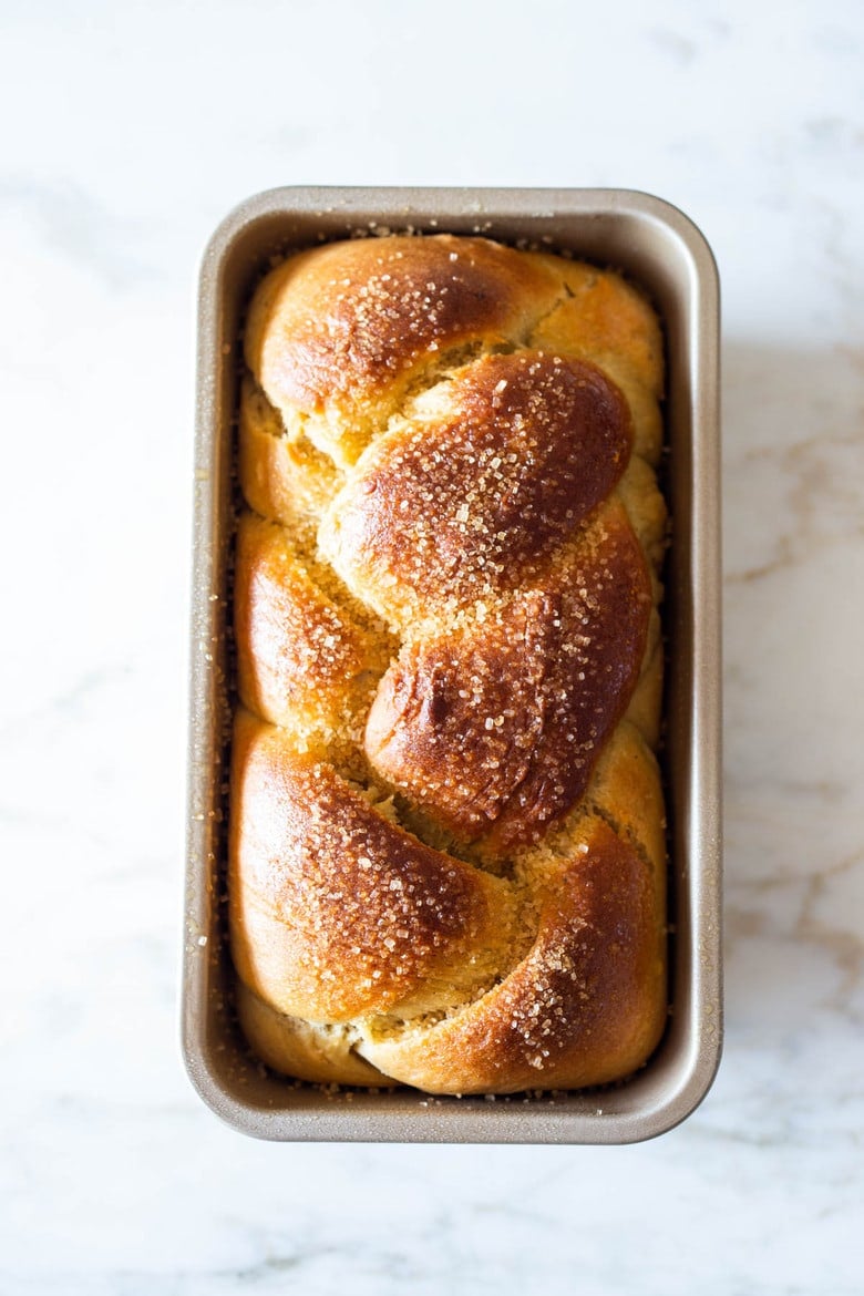 A traditional recipe for Pulla- a slightly sweet, Finnish Cardamon Bread that tastes and smells heavenly. Perfect for mornings or afternoon tea. | www.feastingathome.com. #pulla #pullarecipe #coffeebread #morningbread #finnishbread #finnishrecipes