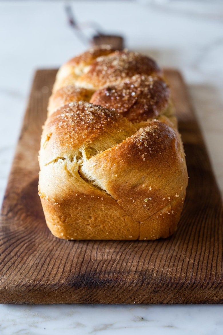 A traditional recipe for Pulla- a slightly sweet, Finnish Cardamon Bread that tastes and smells heavenly. Perfect for mornings or afternoon tea. | www.feastingathome.com. #pulla #pullarecipe #coffeebread #morningbread #finnishbread #finnishrecipes