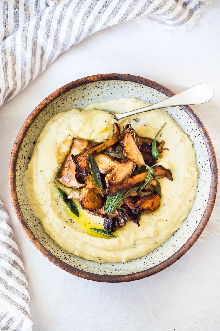  Creamy Polenta with Wild Mushrooms, Garlic and Sage. A simple vegetarian dinner that can be made in under 30 minutes. Comforting and delicious, perfect for busy weeknight dinners.