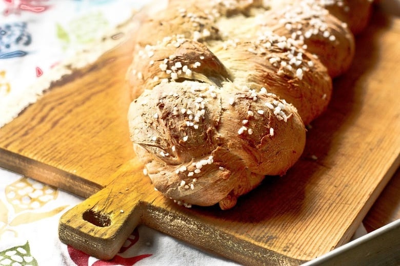 A traditional recipe for Pulla- a Finnish Style Cardamon Bread that tastes and smells heavenly. Perfect for mornings or afternoon tea. | www.feastingathome.com