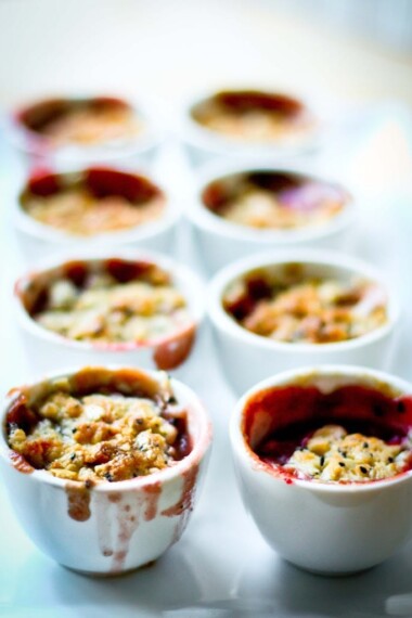 Mini pear and berry crumbles