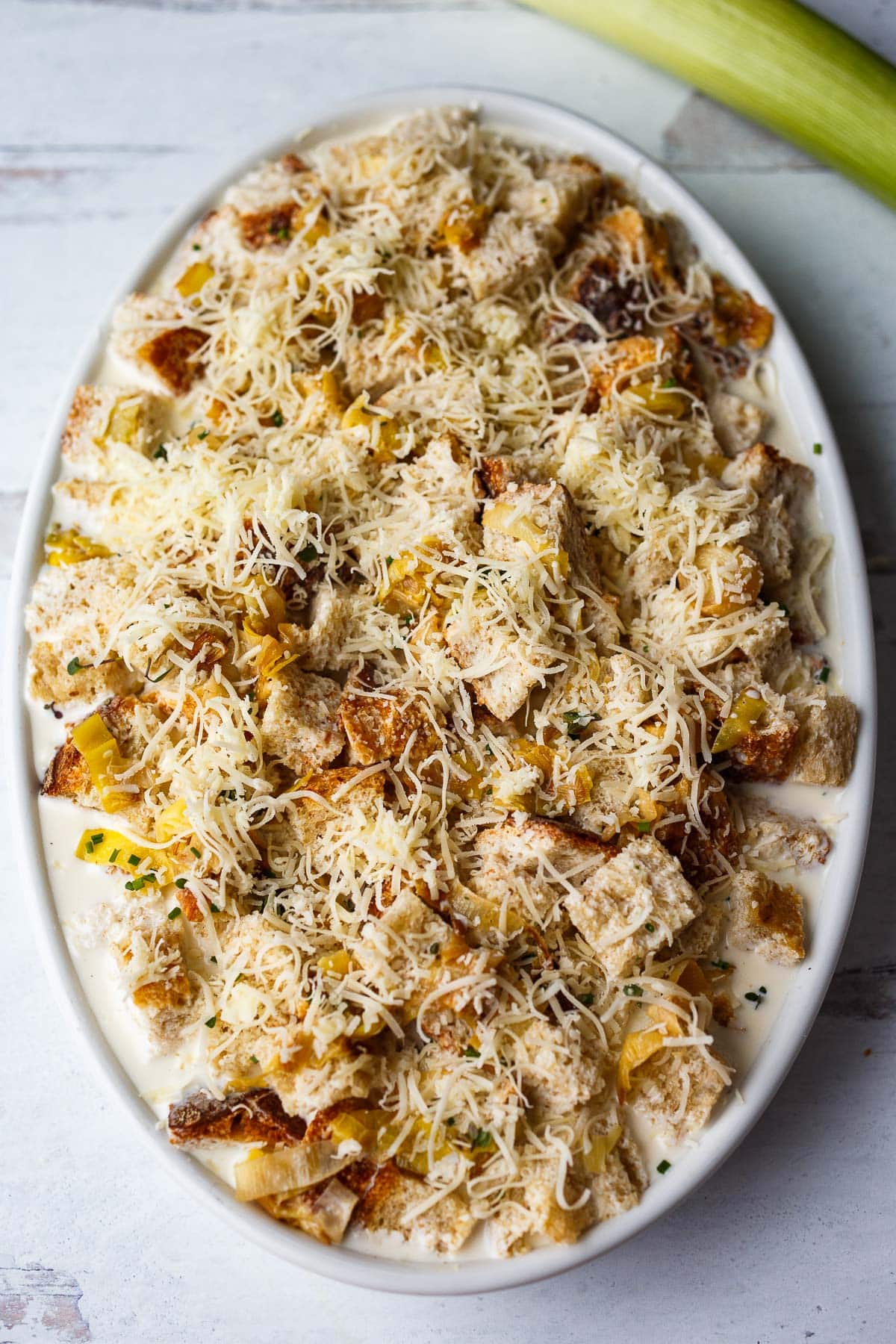 savory leek bread pudding before it is baked.