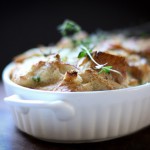 Savory Leek Bread Pudding with Gruyere and Thyme - a delicious side dish, perfect for the holiday table. #leek #leekrecipes #breadpudding #side #sidedish #thanksgiving | www.feastingathome.com