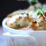 Savory Leek Bread Pudding with Gruyere and Thyme - a delicious side dish, perfect for the holiday table. #leek #leekrecipes #breadpudding #side #sidedish #thanksgiving | www.feastingathome.com