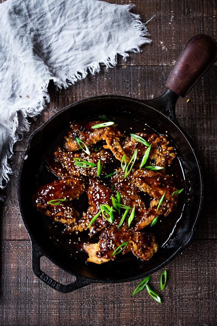 Crispy Korean Chicken Wings with Korean Gochujang Sauce! These crispy wings are extra crispy, spicy and full of flavor! #wings #chickenwings #koreanchickenwings #superbowl #suberbowlrecipes #gochujang 