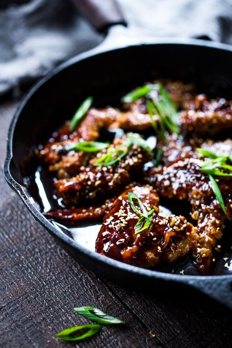 Crispy Korean Chicken Wings with Korean Gochujang Sauce! These crispy wings are extra crispy, spicy and full of flavor! #wings #chickenwings #koreanchickenwings #superbowl #suberbowlrecipes #gochujang 