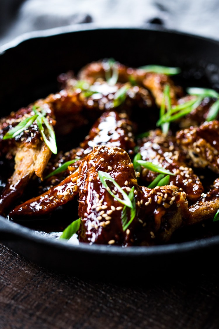 Crispy Korean Chicken Wings with Korean Gochujang Sauce! These crispy wings are extra crispy, spicy and full of flavor! #wings #chickenwings #koreanchickenwings #superbowl #suberbowlrecipes #gochujang
