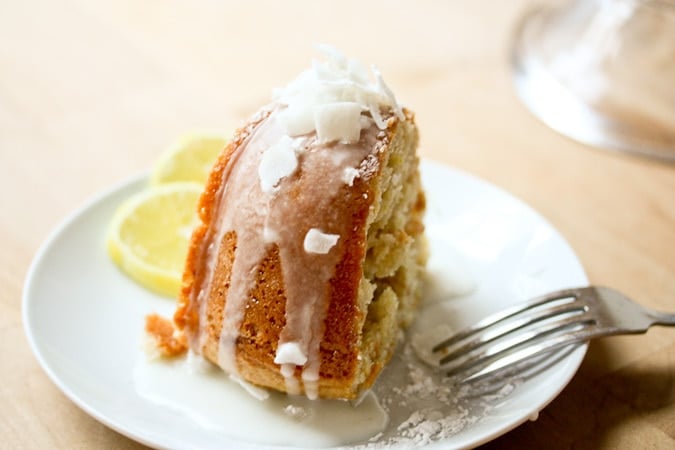 One Bowl Vegan Meyer Lemon Coconut Bundt Cake...SO easy and delicious! Make this in one bowl, and pour and bake! #vegan #bundt #Bundtcake #lemoncake #vegancake www.feastingathome.com