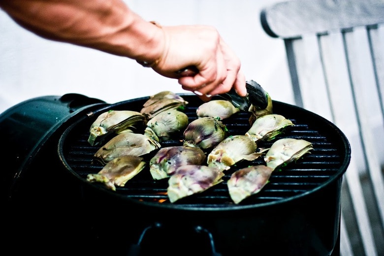 Grilled Artichokes with vegan adaptable Basil Aioli and herb oil - a delicious way to serve artichokes!