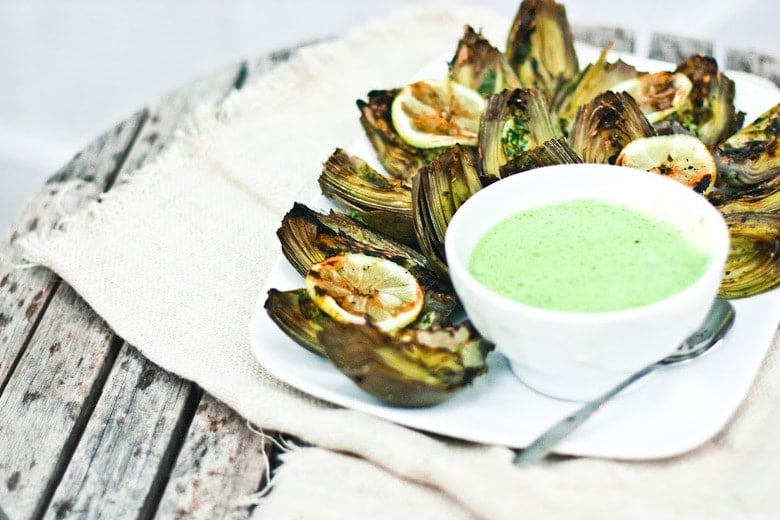 Grilled Artichokes with vegan adaptable Basil Aioli and herb oil - a delicious way to serve artichokes!