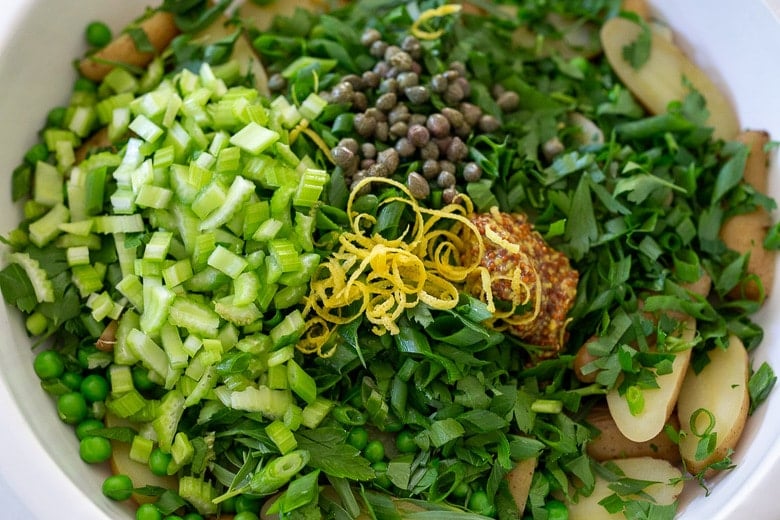 add capers, zest and mustard to the salad