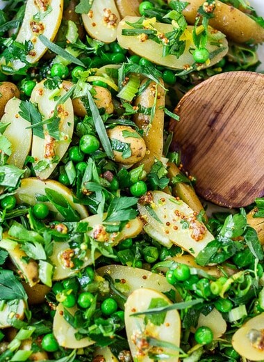 Potato Pea Salad with an herby Tarragon dressing. This zesty, vegan potato salad is loaded with fresh herbs and flavor!  A delicious, healthy salad that can be made ahead. #potatosalad