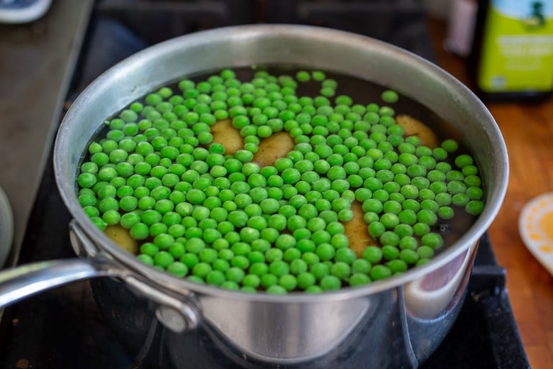 add the peas to the potato water, blanch 2 minutes. 