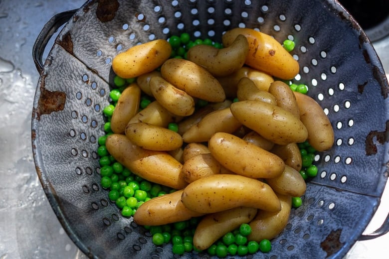 drain the peas and potatoes