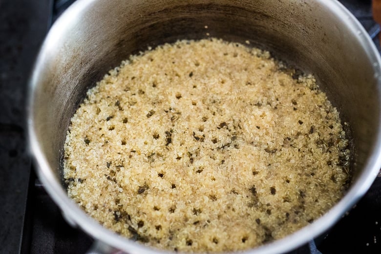 quinoa cooking in a pan