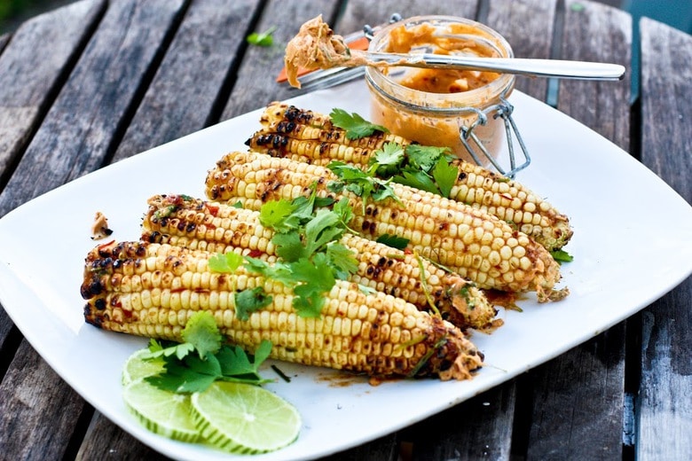 Grilled Corn with Chipotle Butter, cilantro and lime. | www.feastingathome.com