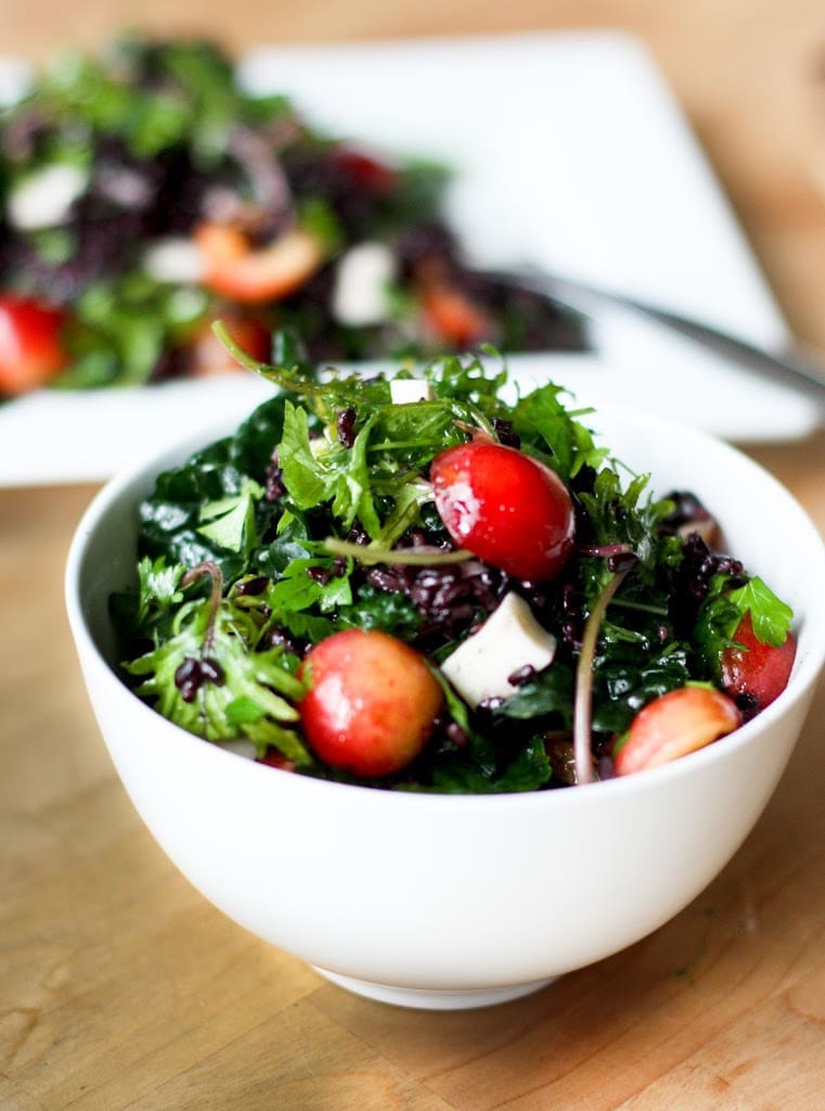 Kale Salad with fresh cherries, black rice, Haloumi and Mint! A simple summer salad that can be made ahead! #cherries #freshcherries #cherrysalad 