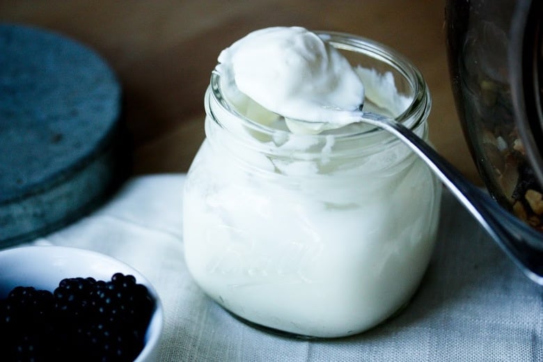 How to make homemade Yogurt from RAW unpasteurized milk- an easy guide with no special equipment needed! | www.feastingathome.com