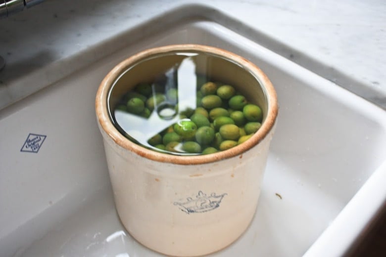 How to Cure Olives with Lye - a step by step guide, that turns bitter olives into buttery delicious bites the whole family will enjoy.