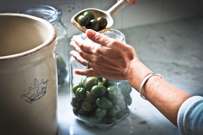 How to Cure Olives with Lye - a step by step guide, that turns bitter olives into buttery delicious bites the whole family will enjoy. 