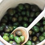 How to Cure Olives with Lye - a step by step guide, that turns bitter olives into buttery delicious bites the whole family will enjoy. #curingolives #curedolives #howtocureolives