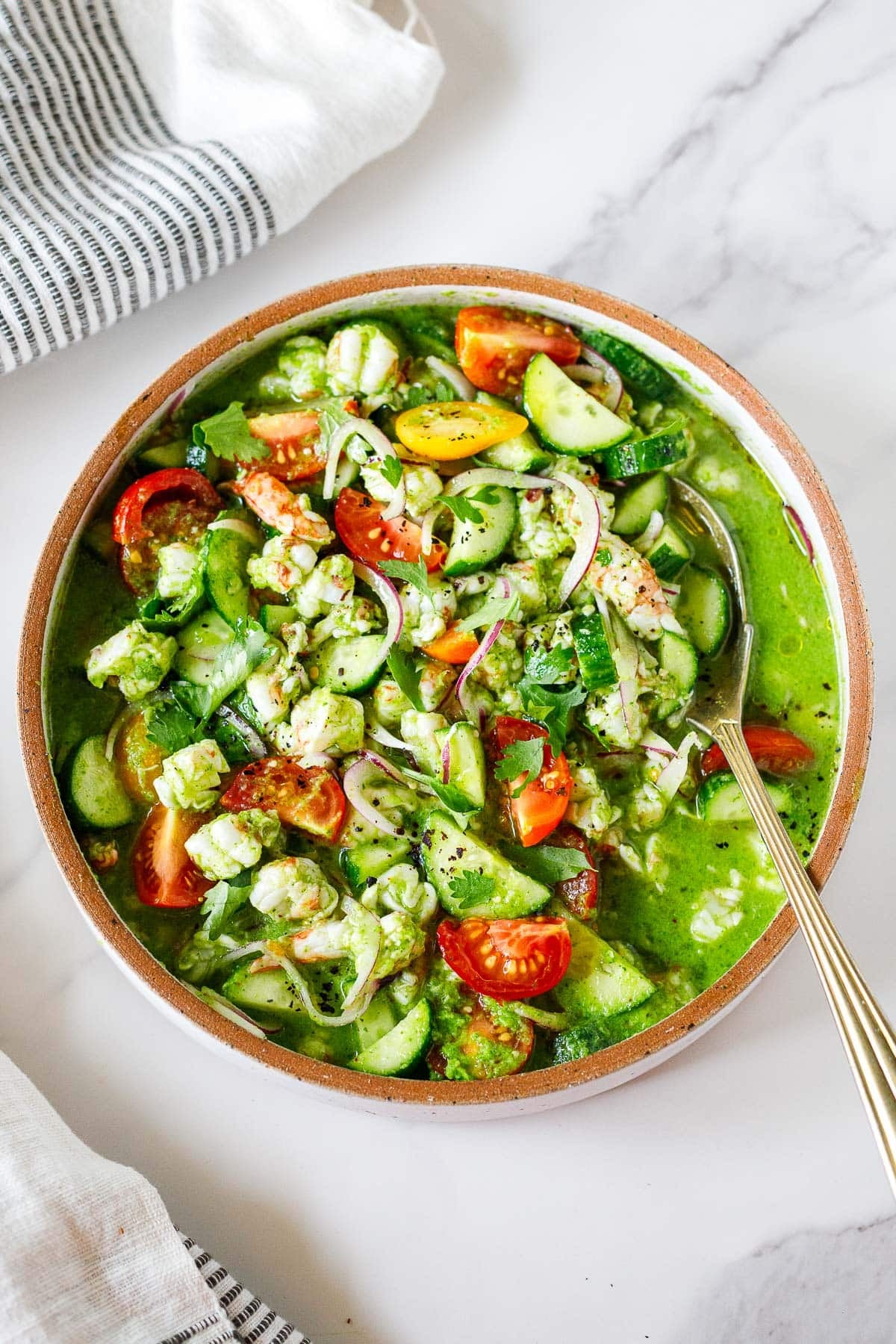 This Shrimp Ceviche Verde features tender shrimp, tomatillos, cucumber, tomatoes, cilantro, and jalapeño in a bright, zesty lime dressing. A fresh, vibrant no-cook Mexican appetizer perfect for summer!
