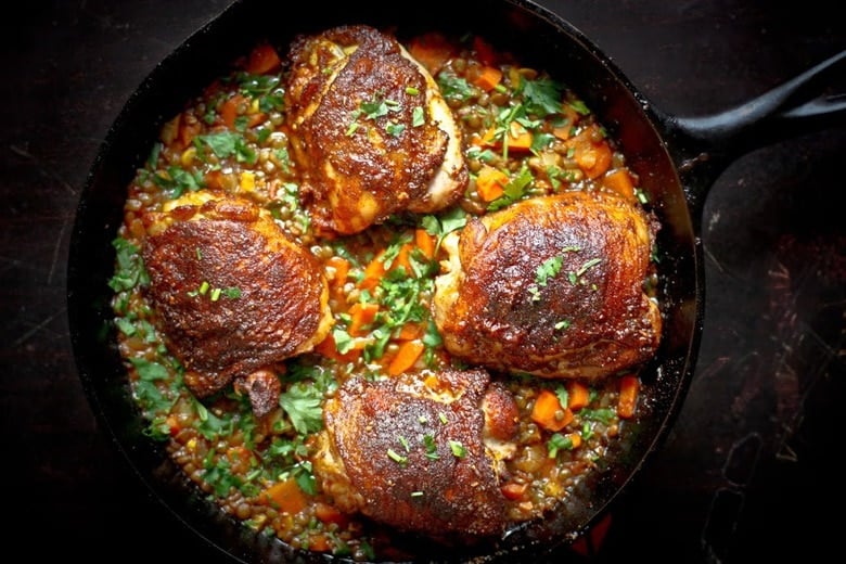  A deliciously flavorful recipe for Berbere Chicken over Ethiopian spiced Lentils with an easy recipe for Berbere Spice Blend. | www.feastingathome.com