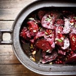 Moroccan Roasted Beets with Pomegranate Seeds, toasted pistachios and a balsamic glaze. A simple, healthy vegan side dish. #moroccanbeets #veganside #roastedbeets #cleaneating #plantbased