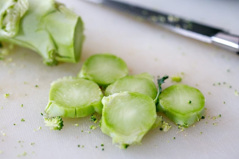 broccoli stems being sliced