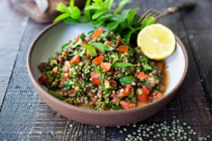 This Simple Lentil Tabouli Salad is full of Middle Eastern flavor! Filling lentils are paired with summer  tomatoes, lemon, mint and parsley and a unique combination of spices, and keeps for several days, perfect for midweek lunches or potlucks! Vegan and Gluten-Free #tabouli #lentil #lentils #lentilsalad #lentiltabouli #lentiltabbouleh #tabbouleh #vegan #salad #glutenfree