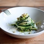 Zucchini Linguine with garlic, olive oil, toasted pine nuts, basil ribbons & shaved pecorino cheese, a simple delicious GF meal,made w/ Zucchini "noodles"! | www.feastingathome.com