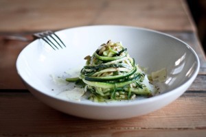 Zucchini Linguine with garlic, olive oil, toasted pine nuts, basil ribbons & shaved pecorino cheese, a simple delicious GF meal,made w/ Zucchini "noodles"! | www.feastingathome.com #zoodles #zucchininoodles #lowcarb #zucchini #spiralized