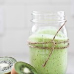 This Kiwi Smoothie is sure to brighten your day!  Made with banana, avocado, and spinach, it's sweet and tart, and deliciously addicting. Vegan!