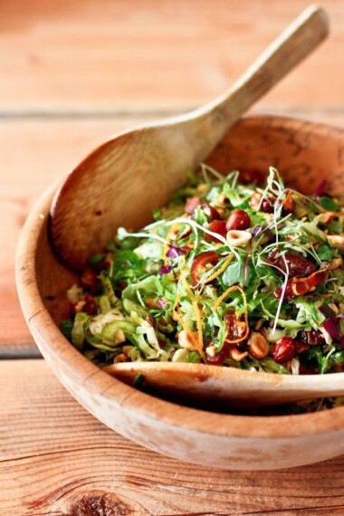 Brussel Sprout Salad with Hazelnuts and Dates! This easy healthy vegan salad has a delicious combination of flavors and can be made ahead! | www.feastingathome.com #brusselsproutsalad #brusselsprouts #vegansalad #dates #brusselsproutslaw #shreddedbrusselsprouts