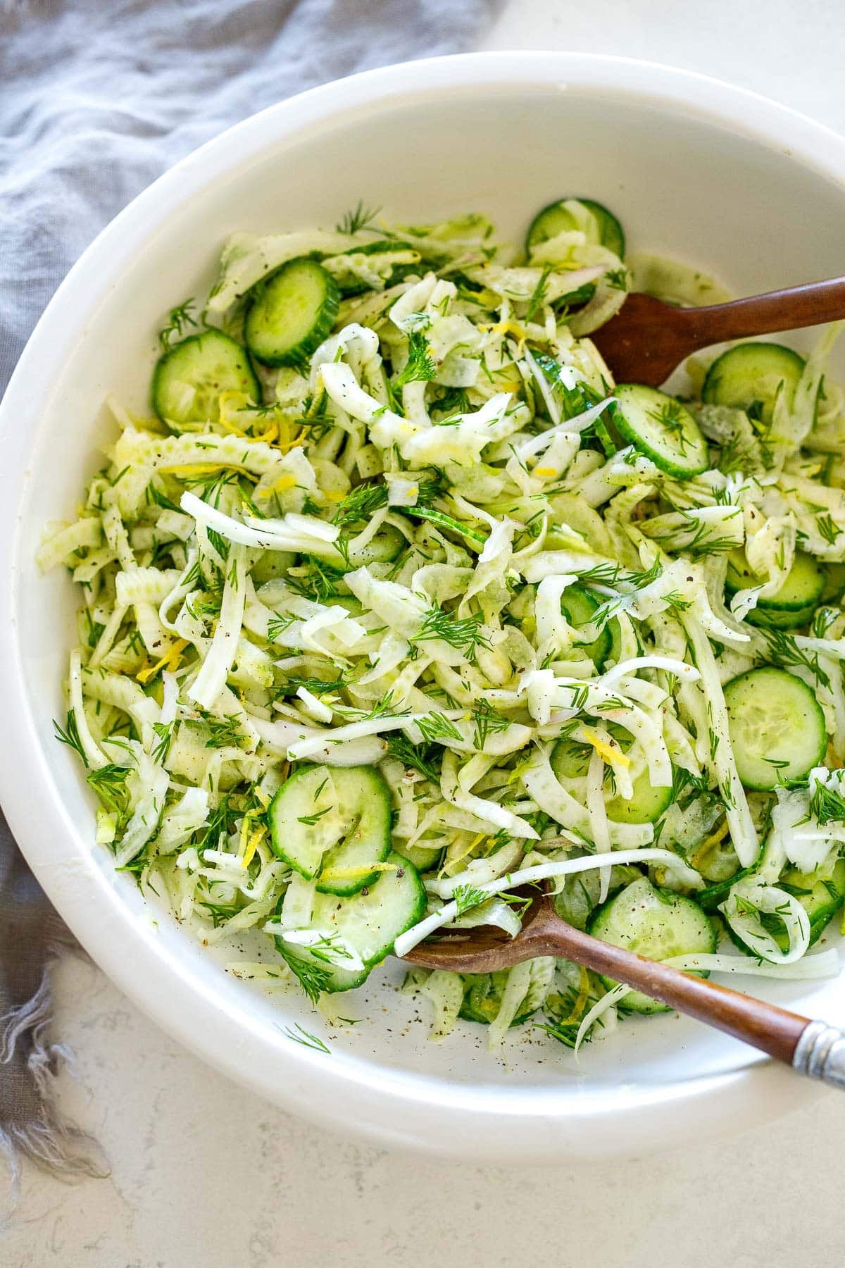 This shaved fennel salad recipe uses thinly sliced fennel bulb, cucumber, and fresh dill tossed in a lemony dressing. Refreshing and light, it is a vegan side dish that can be made ahead and pairs well with many things!