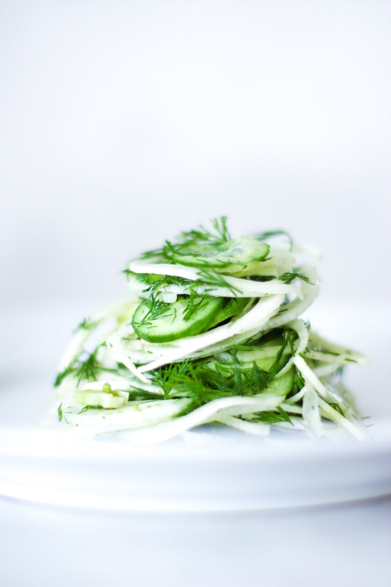 Simple, delicious Fennel Salad with cucumber and fresh Dill. Refreshing and light, this vegan salad can be made ahead, and pairs with so many things! #fennelsalad #fennel #vegansalad #plantbased #fennelslaw