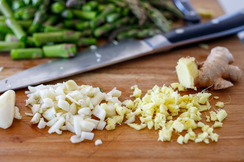 prepping the aspargus stir fry ingredients