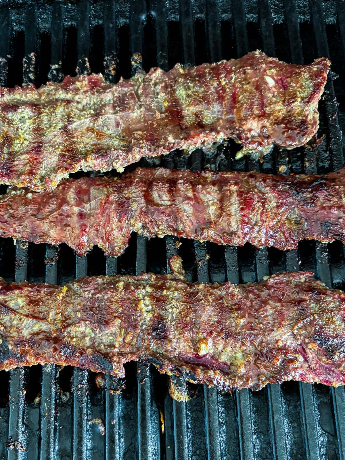 grilled lemongrass beef on grill.