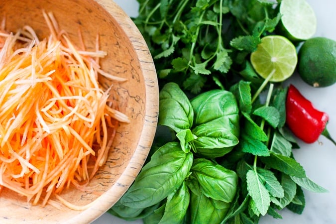 Light and refreshing, Vietnamese Beef and Green Papaya Salad- full of amazing flavor this salad is simple to make using fresh authentic Vietnamese ingredients!  #greenpapayasalad #vietnamesesalad #greenapapaya #lemongrass #vietnamese 