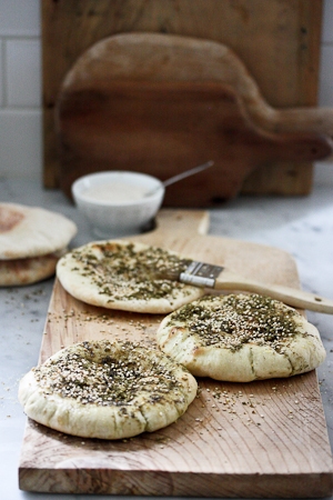 How to make delicious pita bread from scratch and turn it into the tastiest snack by adding zaatar! #pitabread