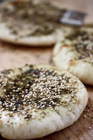 How to make delicious pita bread from scratch and turn it into the tastiest snack by adding zaatar! #pitabread