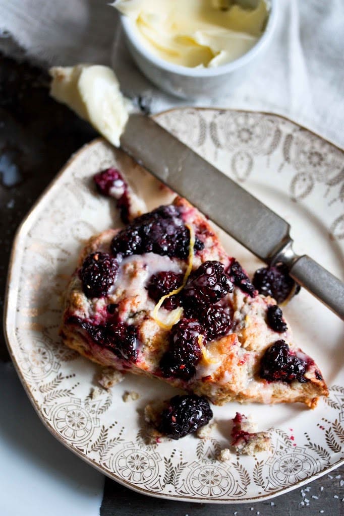 Blackberry Sourdough Scones with Lemony Glaze- plus a little baking tip to help keep blackberries in tact! | www.feastingathome.com