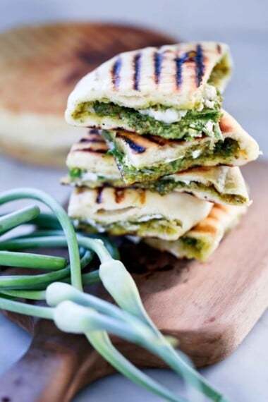 Grilled Naan  filled with an Indian-style, Garlic Scape Chutney and optional melty cheese- a delicious appetizer! Easy, step-by step instructions, perfect every time! Full of great flavor!