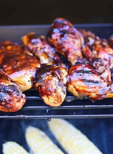 Smokey, Sweet, Spicy and tangy, this BBQ Chicken is mouthwatering! The Chipotle BBQ sauce is made form scratch....so tasty! | #bbqchicken #bbqchickenrecipe #chipotlechicken | www.feastingathome.com
