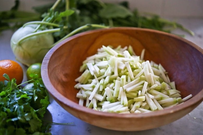 Delicious and refreshing Kohlrabi Slaw with cilantro, jalapeño and lime! Vegan, GF | www.feastingathome.com #kohlrabi #kohlrabirecipes #kohlrabislaw #kohlrabirecipe #kohlrabisalad