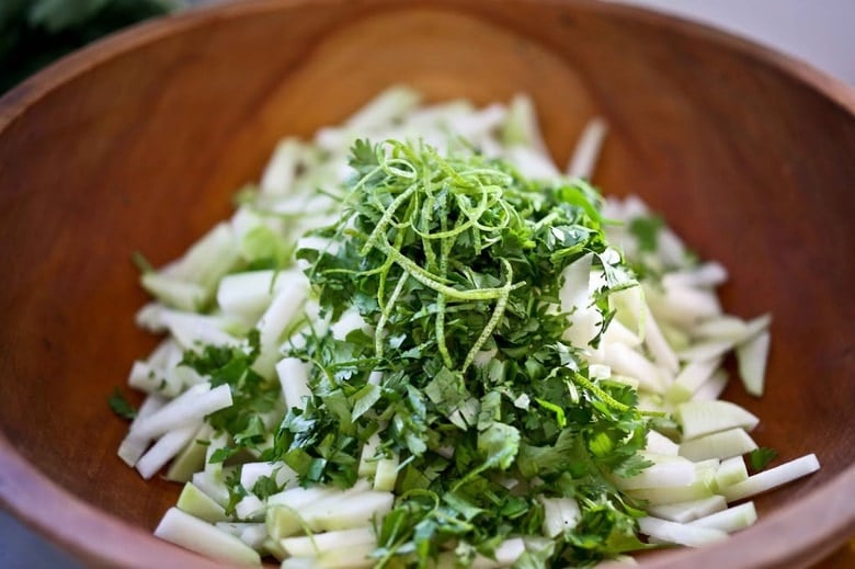 Delicious and refreshing Kohlrabi Slaw with cilantro, jalapeño and lime! Vegan, GF | www.feastingathome.com #kohlrabi #kohlrabirecipes #kohlrabislaw #kohlrabirecipe #kohlrabisalad