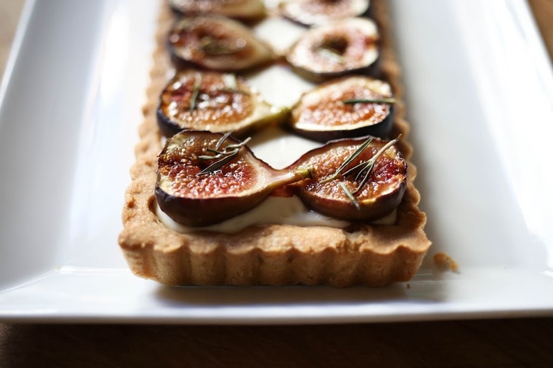 Delicious recipe for Roasted Fig Tart with Honey, Goat cheese and Mascarpone....using fresh figs, lightly roasted and caramelized in the oven. | www.feastingathome.com