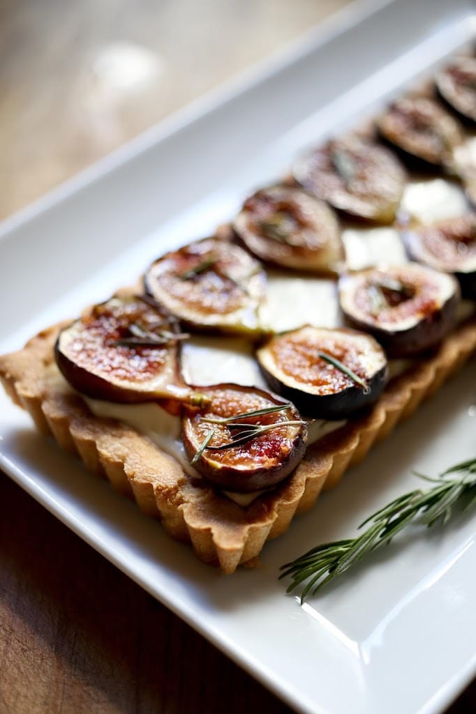 Delicious recipe for Roasted Fig Tart with Honey, Goat cheese and Mascarpone....using fresh figs, lightly roasted and caramelized in the oven. | www.feastingathome.com