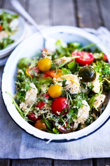 Quinoa Chicken Salad with tomatoes, chickpeas, arugula, fresh herbs & optional mozzarella or feta cheese, in a tangy Lemon Dressing. Great for meal prep!